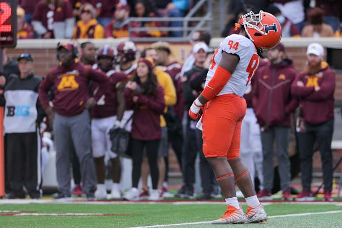Illinois Fighting Illini defensive lineman Jer'Zhan Newton (94) reacts to a missed stop in the third quarter at Huntington Bank Stadium.